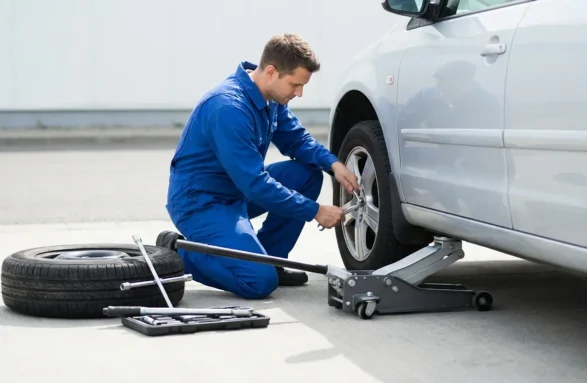 Technician_changing_car_202604141109