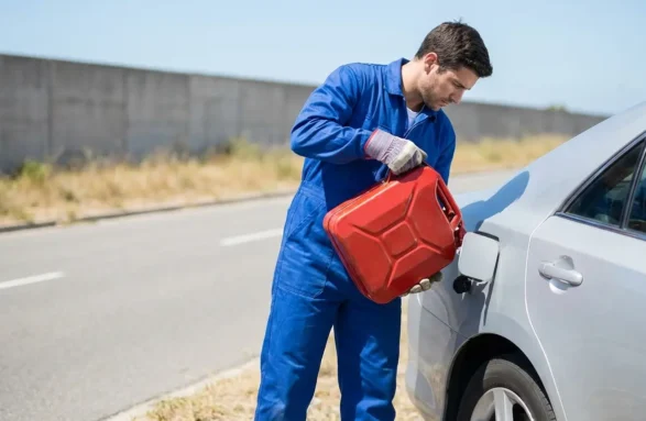 Technician_pouring_fuel_202604141116